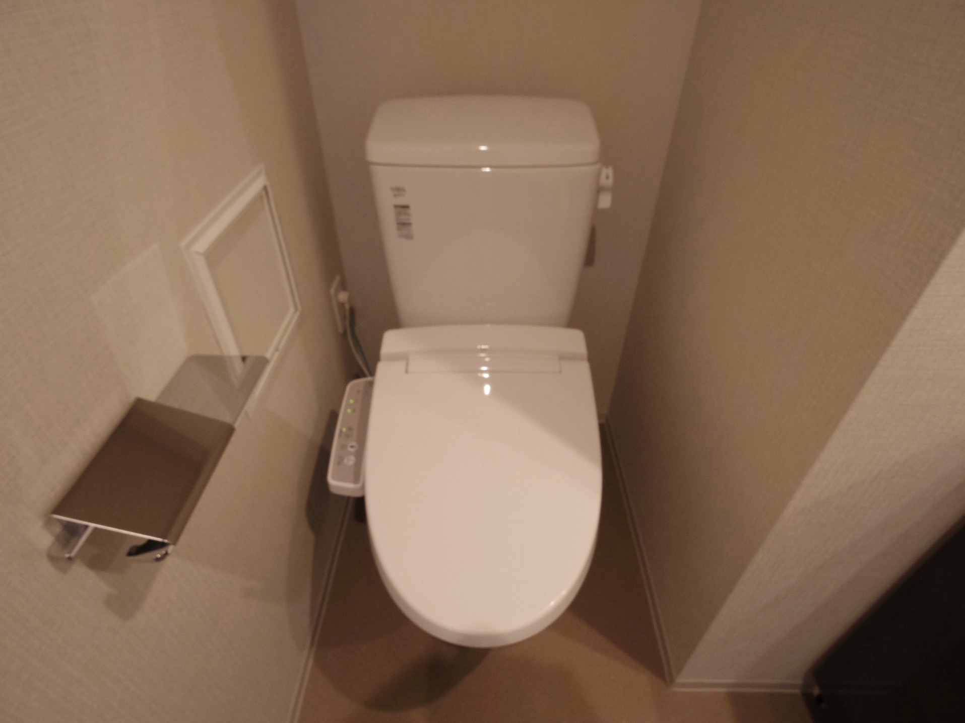 INAX製温水洗浄便座トイレ。